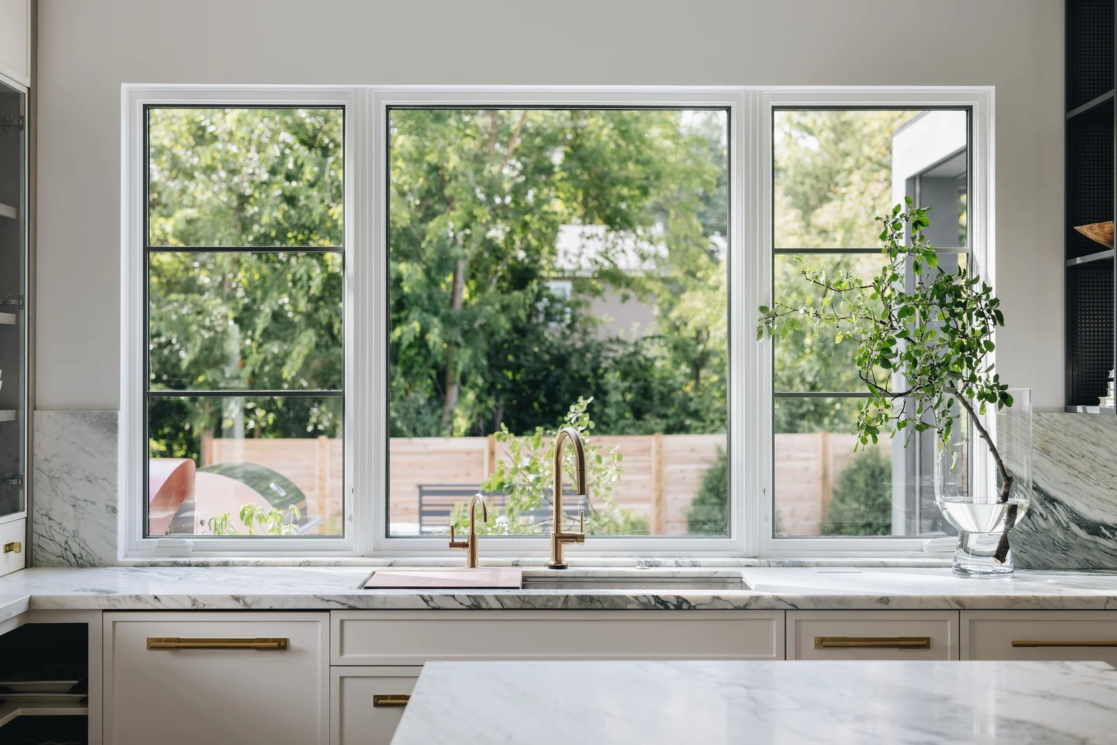 Energy-efficient double-hung windows on a residential home